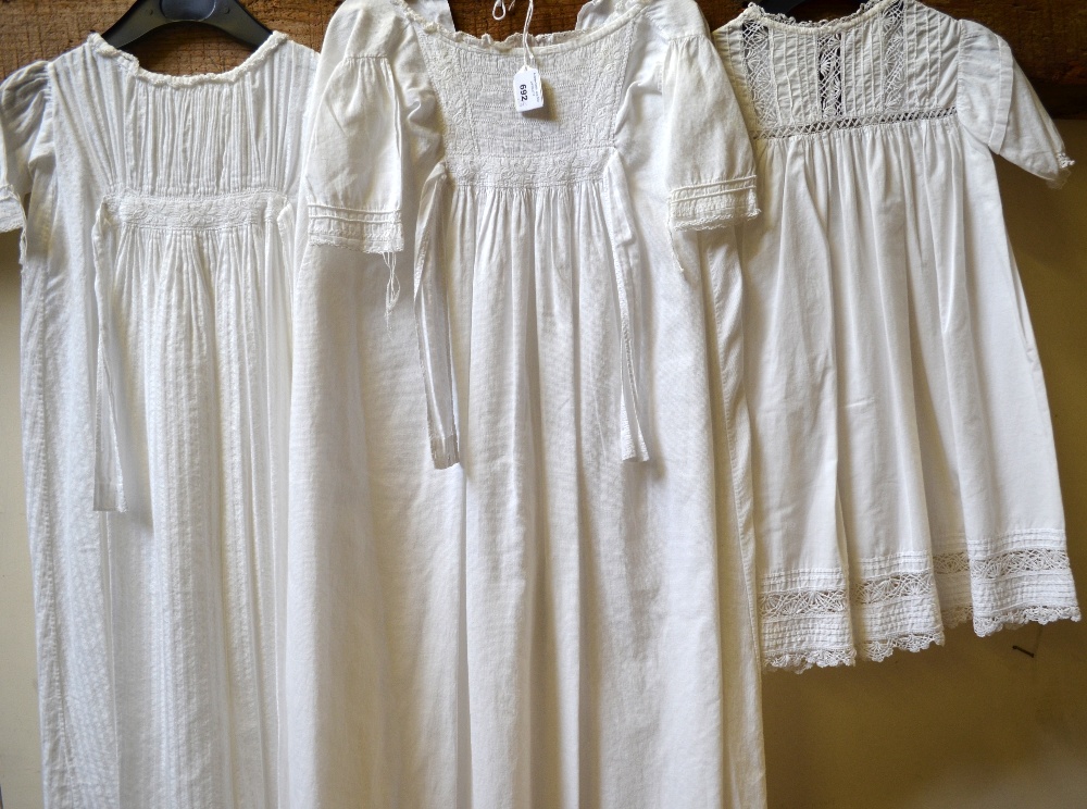 Three Victorian cotton baby's gowns with pin-tucked, smocked and inset lace detail (3)