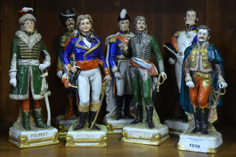 Seven Sitzendorf porcelain figures of Napoleonic officers including Lasalle; Lepic; Murat; Marcheau;