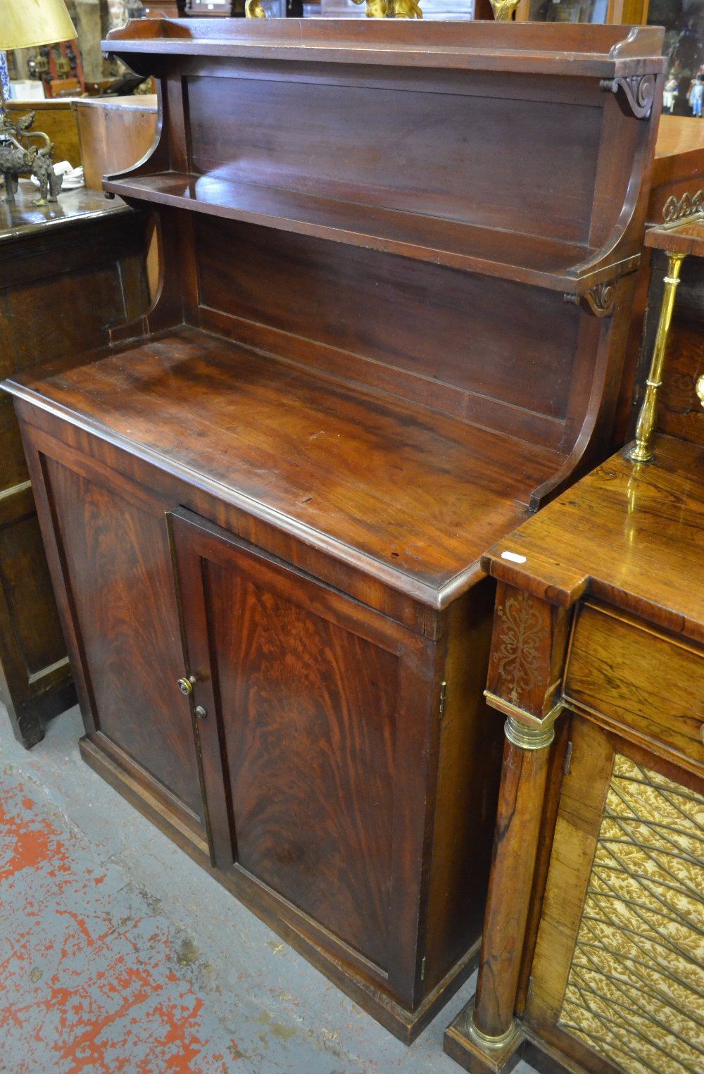 Victorian mahogany chiffonier, the two shelf back over a pair panelled cupboards