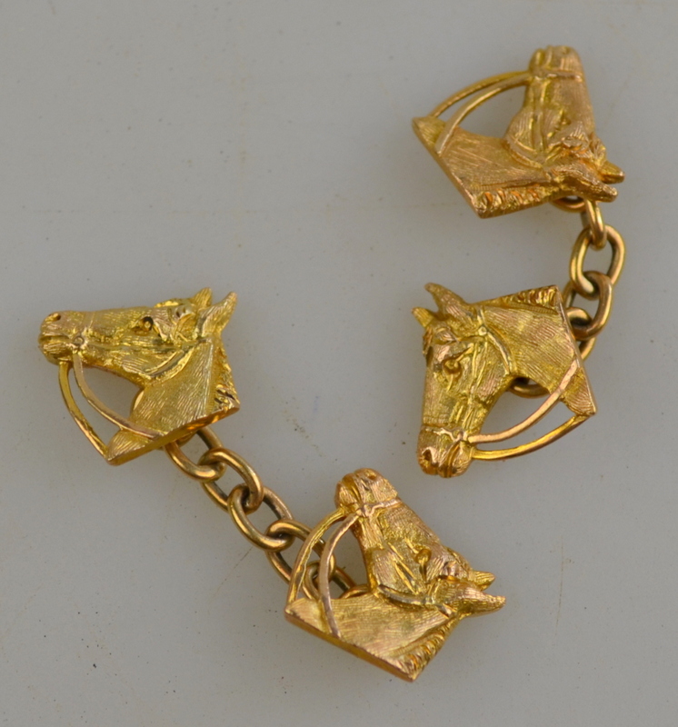 Pair of 9ct yellow gold horse head chain linked cufflinks, approx 9g