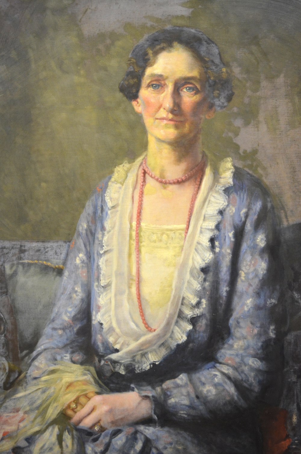 Peggy Bell - Portrait of a lady wearing long pink beads and blue lace edged dress, signed and