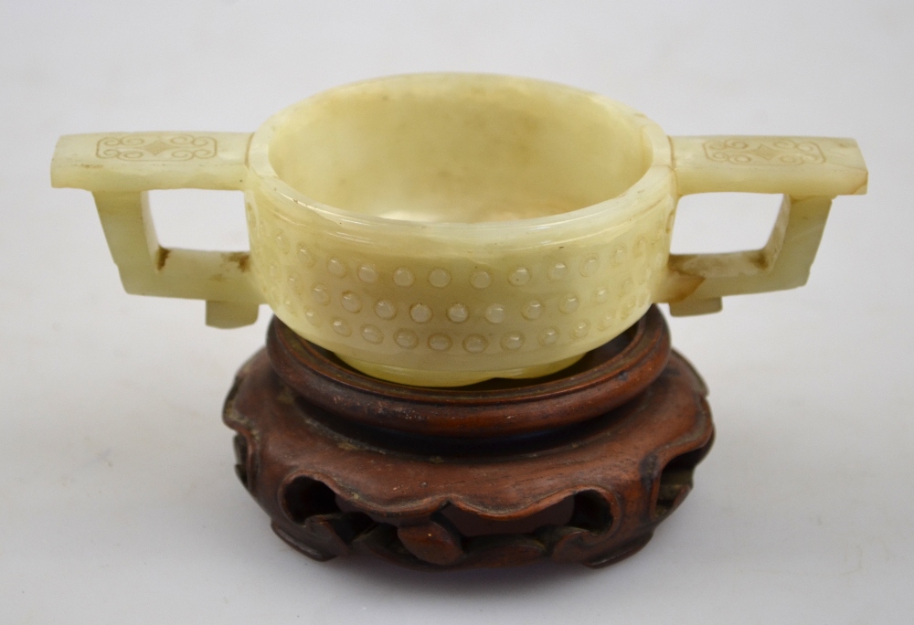 Chinese nephrite mutton fat jade bowl, marriage cup style, carved with three rows of horizontal