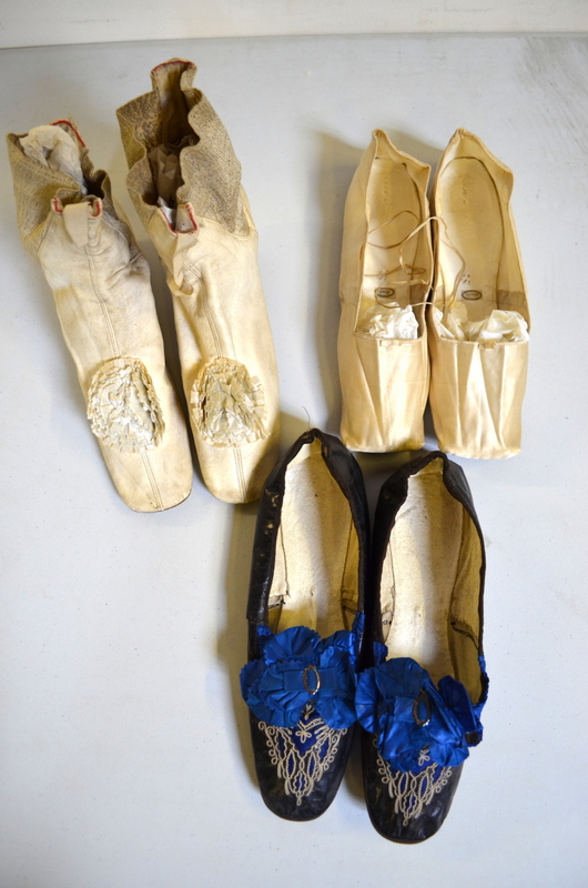 Pair of 18th century cream kid leather shoes with elasticated sides, waisted heels and ivory silk
