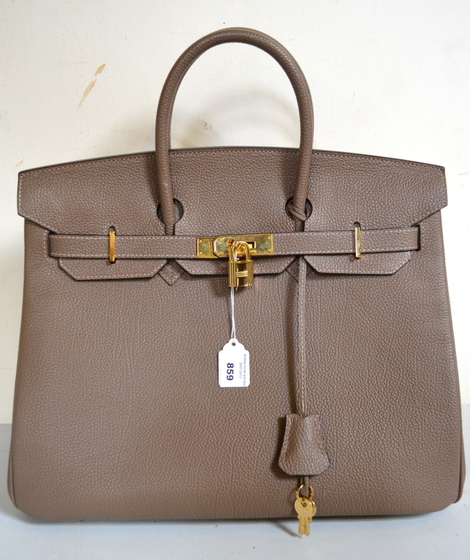 Mushroom tooled leather handbag, 34 cm x 29 cm (not inc. handles) with gilt metal belted/padlock