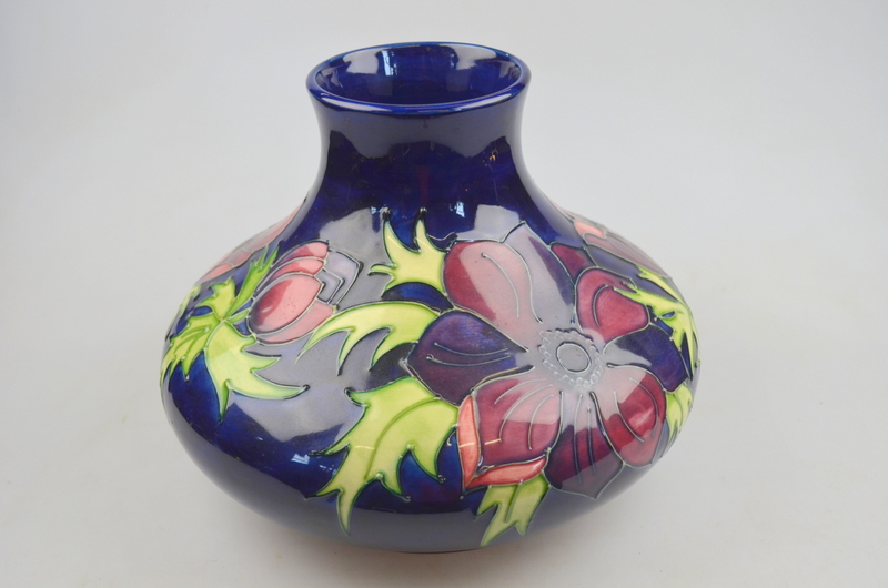 Moorcroft contemporary large squat vase, anemone pattern on a dark blue ground, 21 cm high, possibly