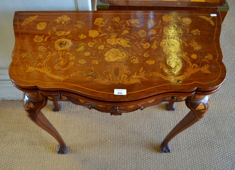 A late 18th century Dutch floral & bird marquetry table, the fold over top inlaid with cards to each