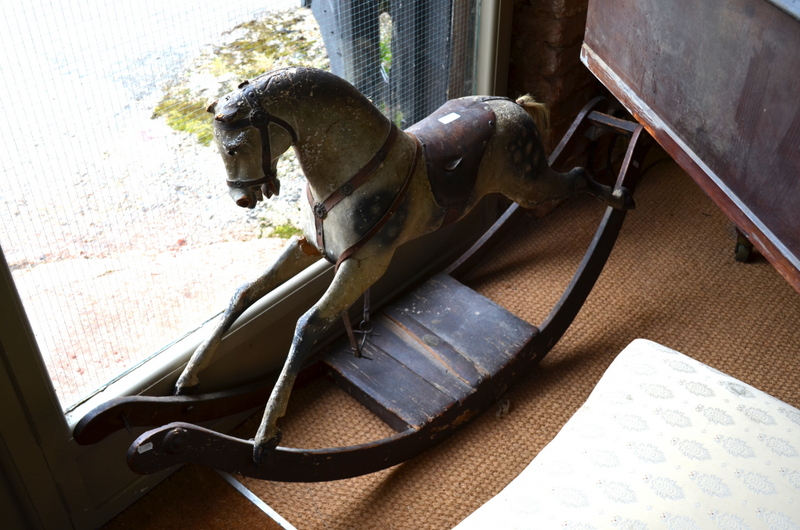 FH Ayres, London. A 19th century carved wood rocking horse, original dapple paint, leather