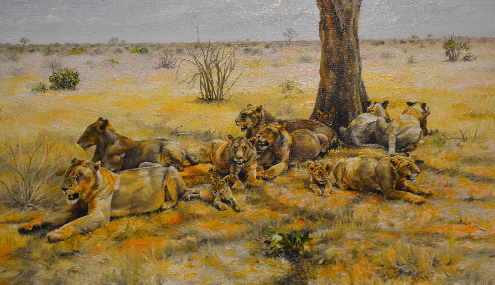 Norman Ward (b. 1960) - 'Lions at Tsavo', oil on canvas, signed and dated 1995, 50 x 75 cm