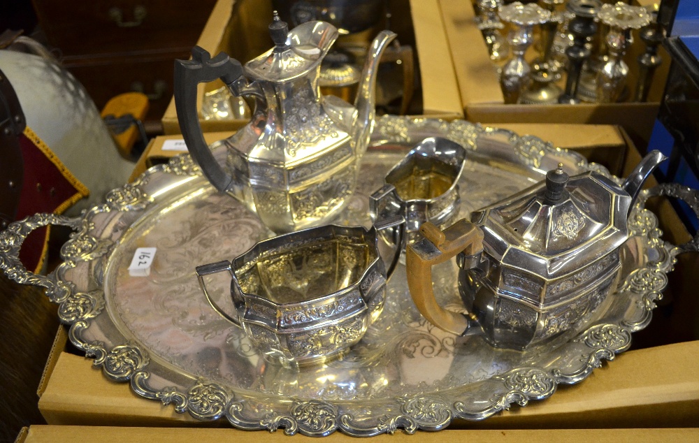 An embossed EPNS four-piece tea/coffee service and an oval tray to/w various brassware