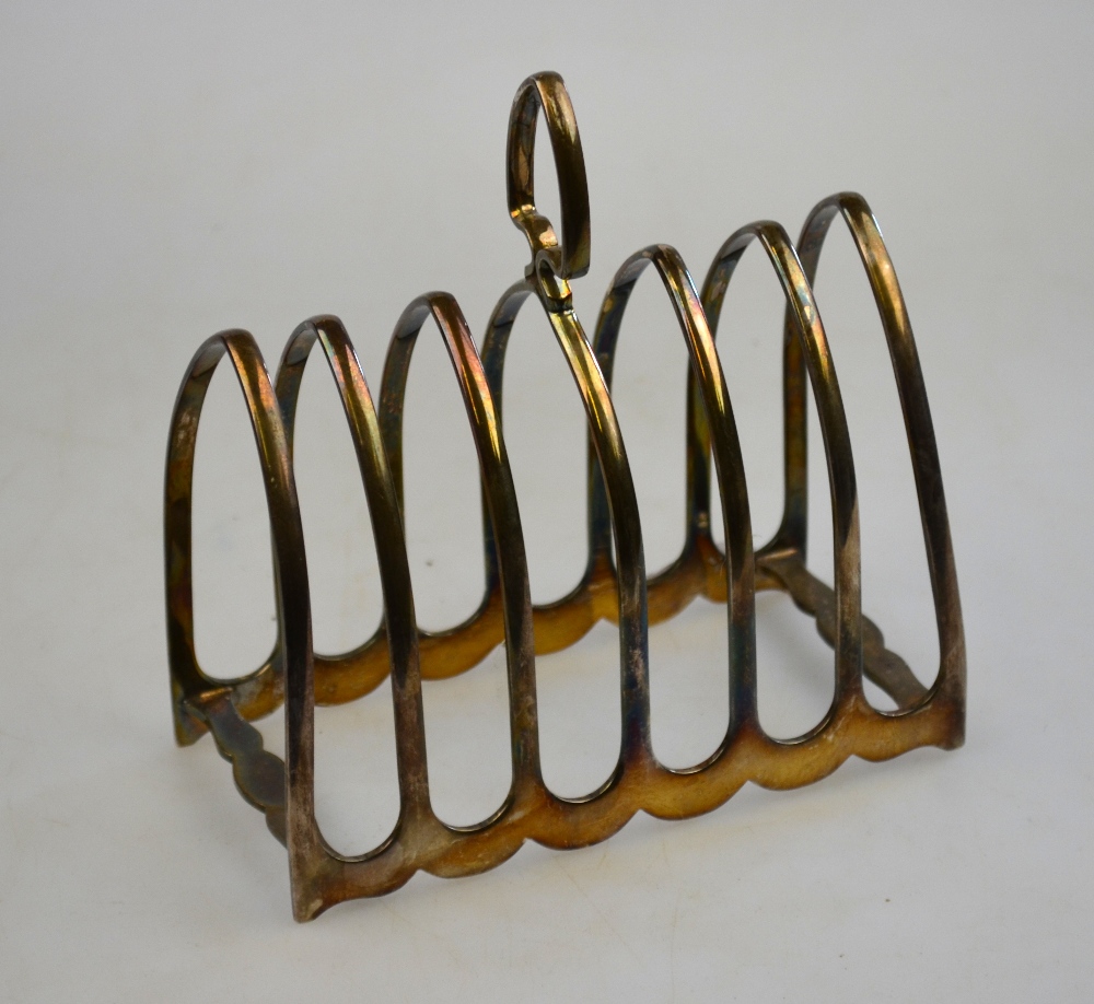 A silver six-division toast rack, Atkins Brothers, Sheffield 1930, 7.6 oz