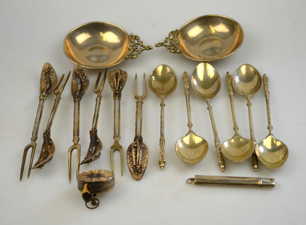A set of six 800 grade teaspoons, a set of unmarked pickle forks with filigree handles and a pair of