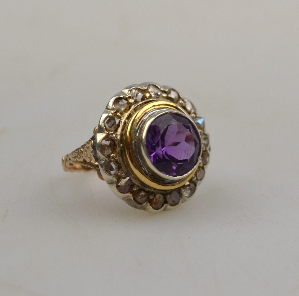 Mauve stone and diamond cluster ring, yellow and white metal set, size J 1/2 Condition Report