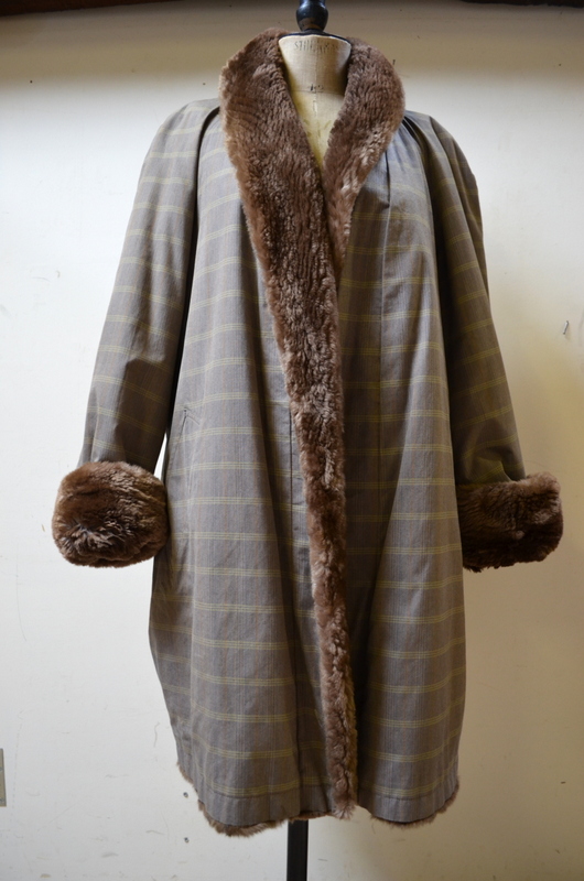 Lady's beige checked raincoat with fur lining and shearling lamb collar and cuffs by Birger