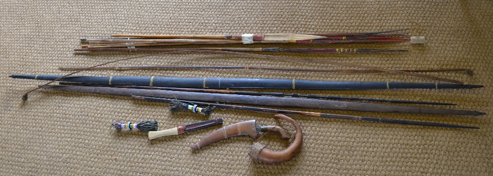 Papua New Guinea bows, arrows, harpoon, penis gourd, dagger etc.