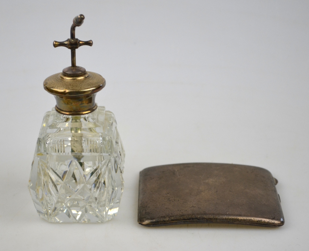 A silver cigarette case, Birmingham 1922, to/w a cut glass atomiser scent bottle with sterling