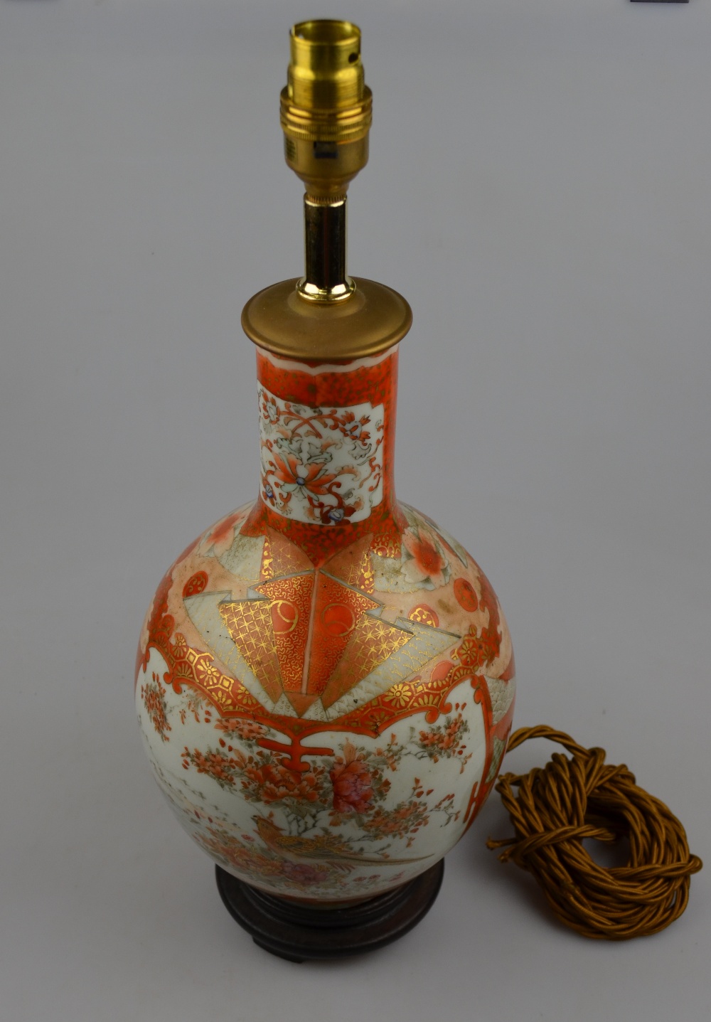 A Japanese Kutani ovoid vase with a cylindrical neck decorated with figures in a landscape, Meiji,