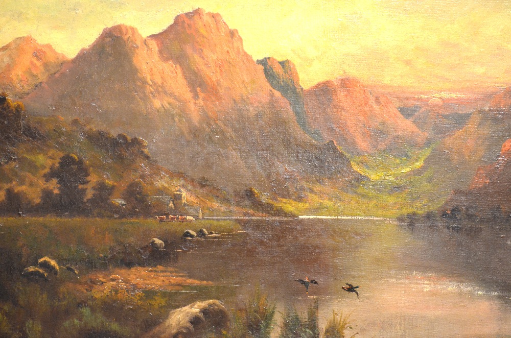 J. Ducker - Sun setting behind rugged mountains, oil on canvas, signed and dated 1921, 49 x 75 cm