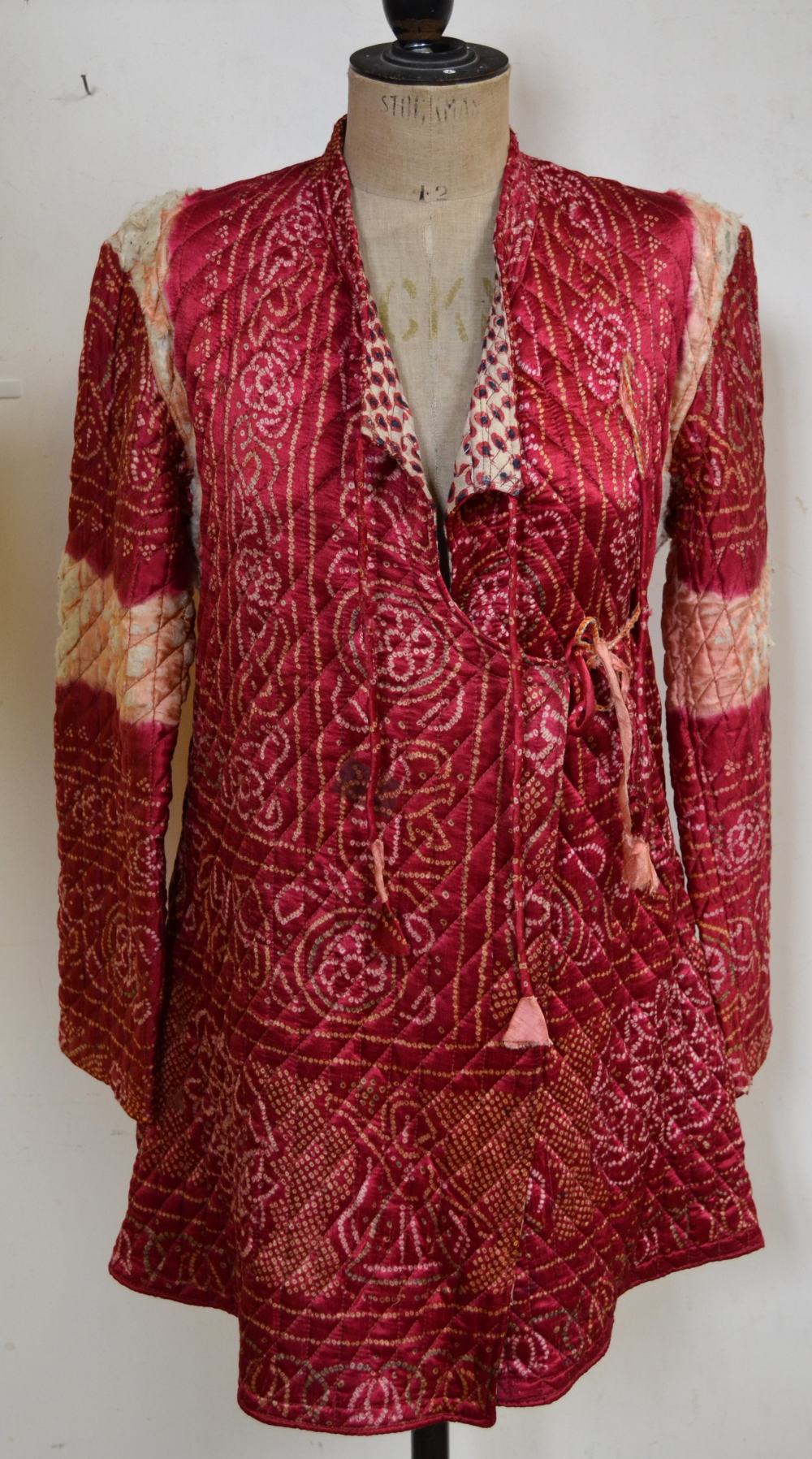 Indian quilted silk cherry red/cream jacket with label 'Gurjari' India Condition Report Silk worn