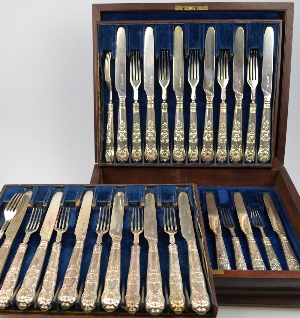 An early Victorian cased set of eighteen each Queen's pattern silver tea knives and forks with