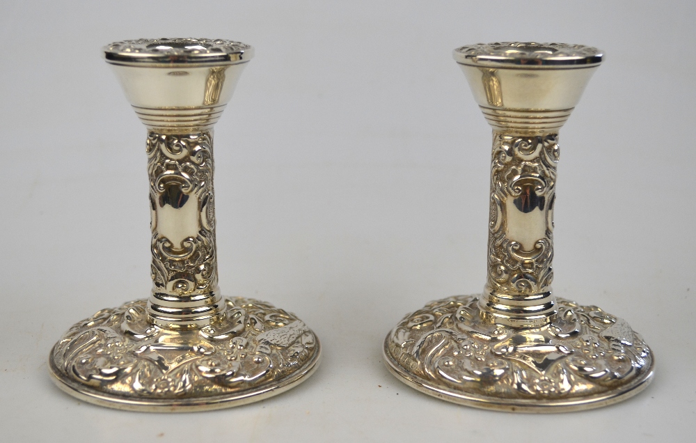 A pair of loaded silver short candlesticks, Birmingham 1978, 10 cm
