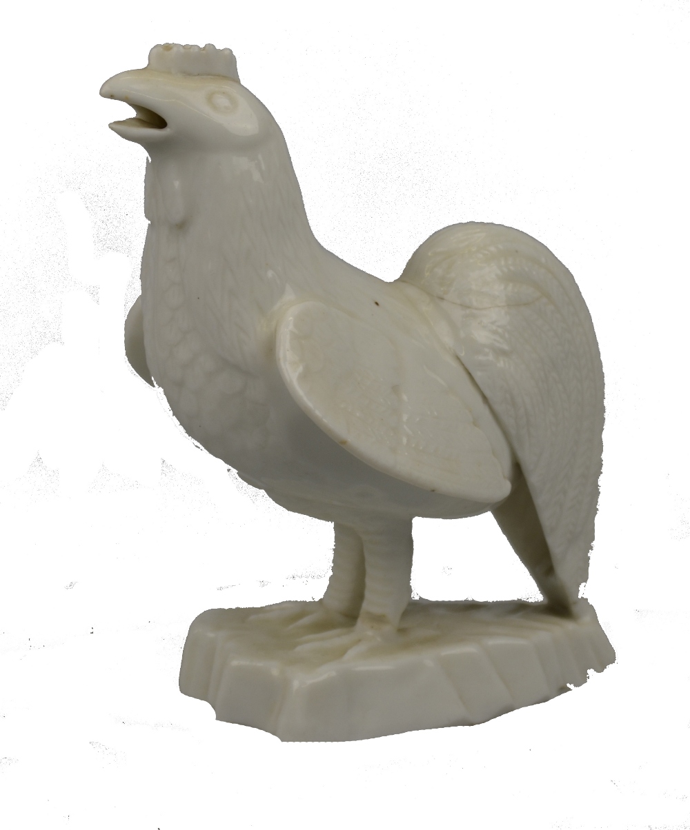 Chinese blanc de chine model of a cockerel raised on a triangular base, c. 1700, 16 cm h.