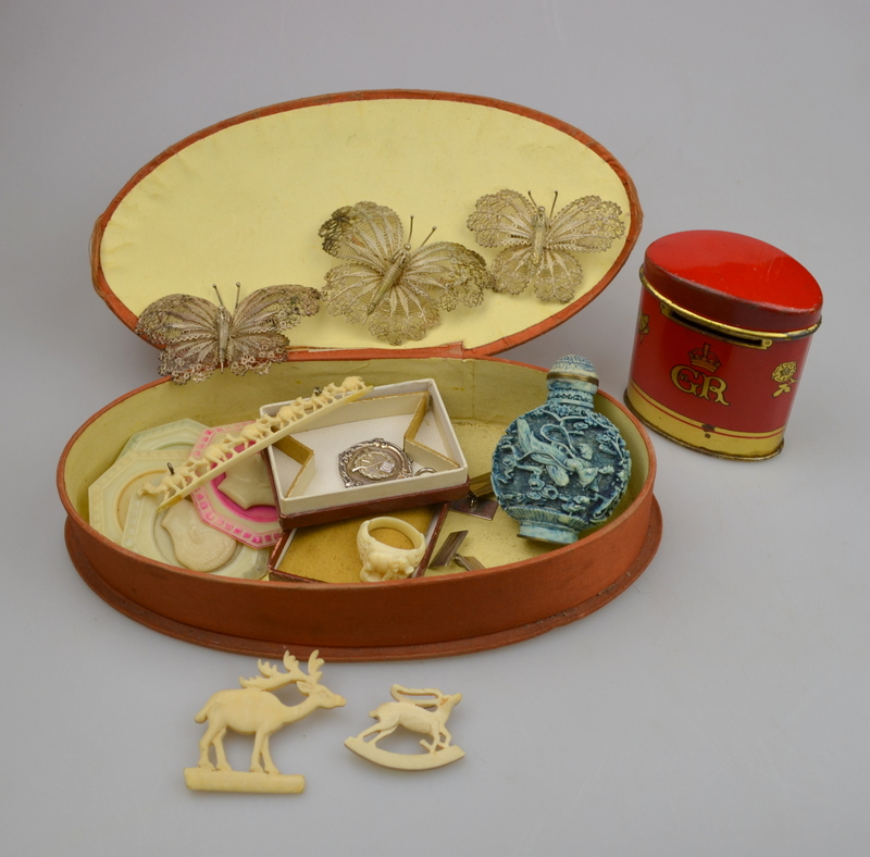 Collection of vintage jewellery including three graduated filigree butterfly brooches; two carved