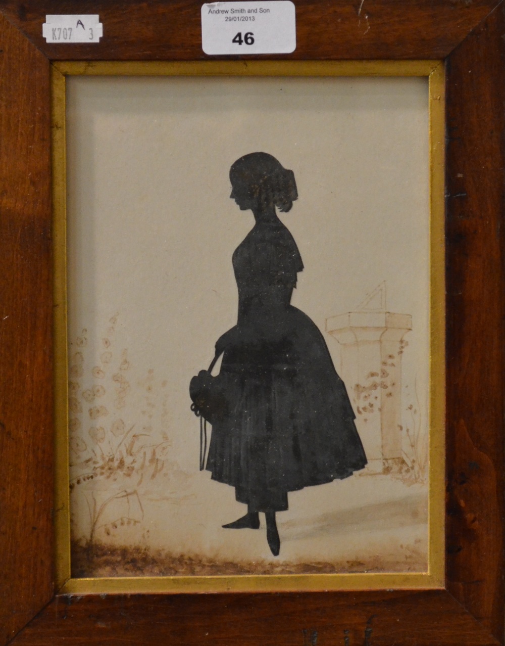 A Victorian silhouette of a woman, with sepia watercolour background, 20.5 x 15 cm Condition