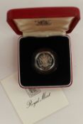 A 1983 silver proof one pound coin in original box