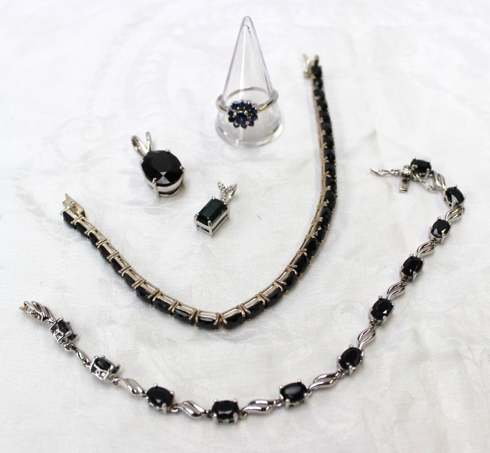 Two silver semi precious gem set bracelets together with two pendants and a ring