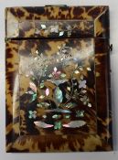 A 19th century tortoise shell and mother of pearl inlaid card carrying case of rectangular form