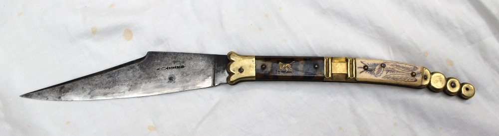 A large 19th century folding knife (Navaja), the steel blade stamped "Girodias", the handle with