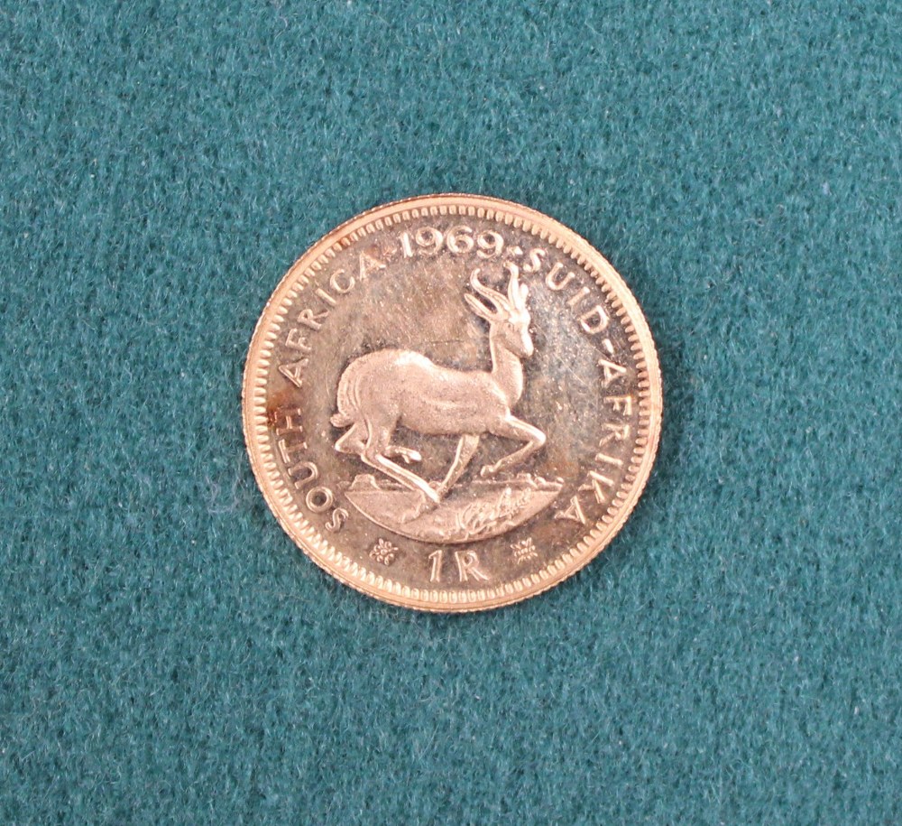 A gold one Rand coin dated 1969