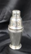 A George V silver sugar caster, the pierced top above a ring turned tapering body, Birmingham, 1925,