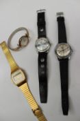 A gentleman`s Timex automatic wristwatch together with three other gentleman`s wristwatches