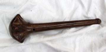A Fiji ula, throwing club, with a lobed pointed head with a tapering handle and knopped terminal