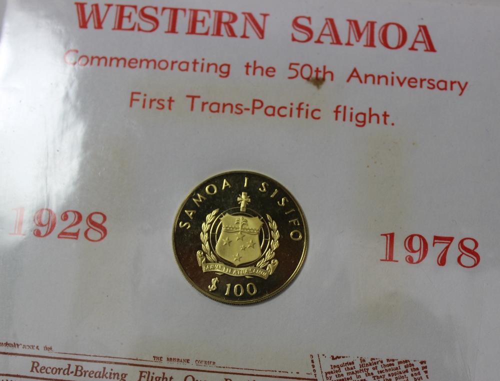 A $100 Tala gold coin mounted in a commemorative stamp cover with certificate