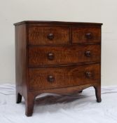 A George III mahogany chest, the bowed top above two short and two long drawers on bracket feet,