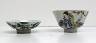 A Chinese porcelain tea bowl and cover painted with a figure fishing, with text, 10cm diameter