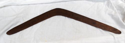 An Aboriginal boomerang of usual form, inscribed Wishing you a Merry Christmas and a Happy New a