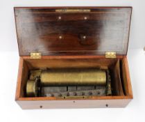 A 19th century rosewood cased cylinder music box, with a 28cm cylinder, 47.5 x 21 cm