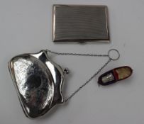 A George V silver purse, engraved with scrolling leaves, Birmingham, 1918, together with a silver