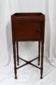 A 19th century mahogany pot cupboard, the square galleried top above a single cupboard door,