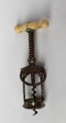 A Columbus patent miniature corkscrew with a bone handle, 10 cm long
