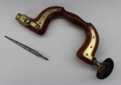 A Fenton & Marsden beech and brass mounted wheel brace, No.986