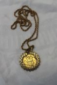 A Victorian gold sovereign dated 1889, in a 9ct yellow gold slip mount on a 9ct yellow gold chain,