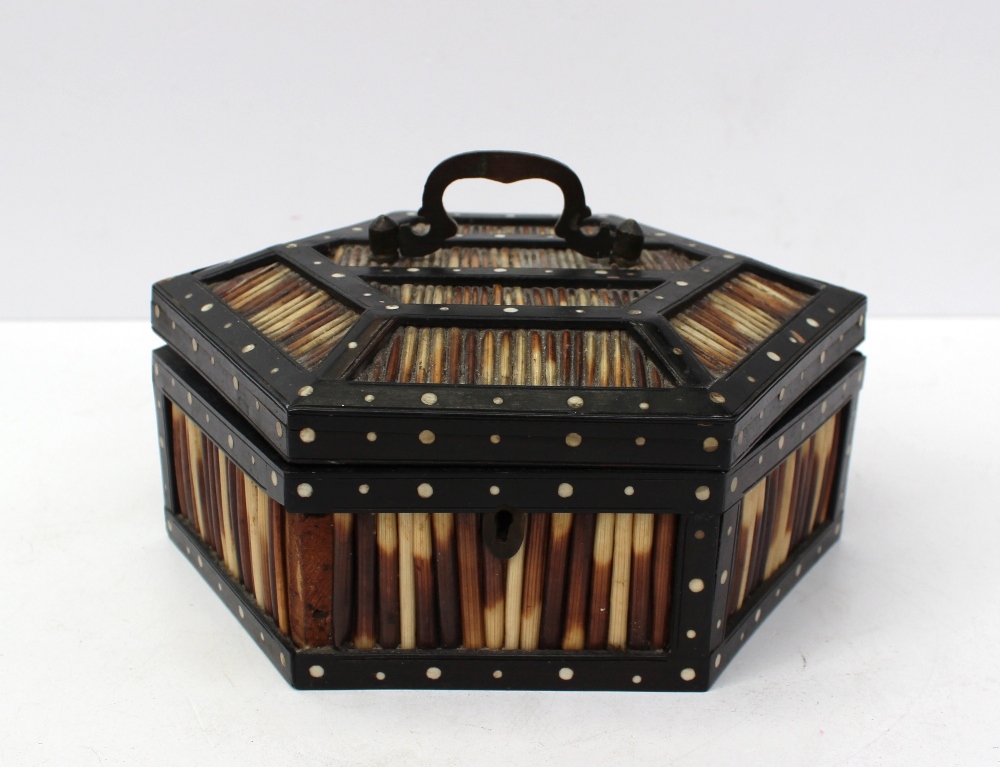 An Indian porcupine quill box of hexagonal front inlaid with ivory dots, marked to the interior of