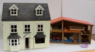 Two dolls houses and assorted dolls house furniture