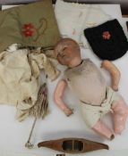 An Armand Marseille Bisque head doll with closing eyes, marked to the rear of the head, A.M. Germany