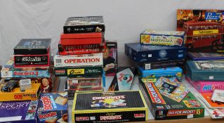 A collection of board games including Operation, Nostalgia, Dingbats, Puzz3D, etc