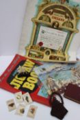 A "Welcom" Jigsaw book together with a collection of James Robertson`s marmalade Pin badges, a